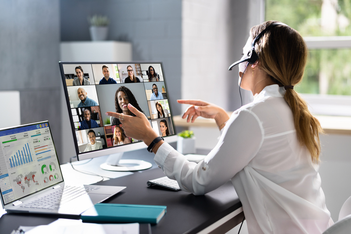 The female representative of a recruitment agency maintains strong connections with candidates to help the company find the best talent for remote positions.