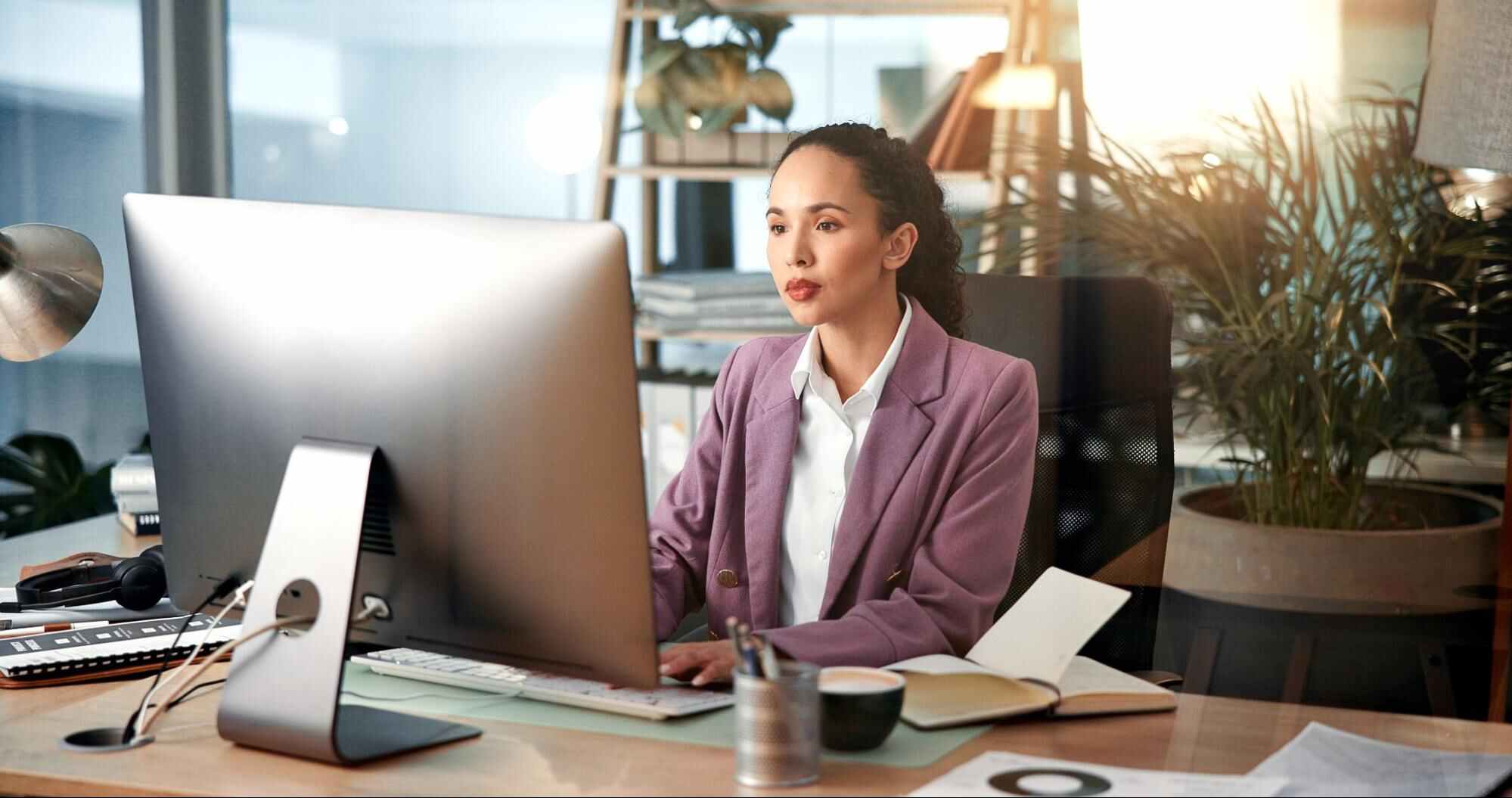 Canadian PEO services supporting a professional team with HR administration, payroll, and workforce management in a modern office.