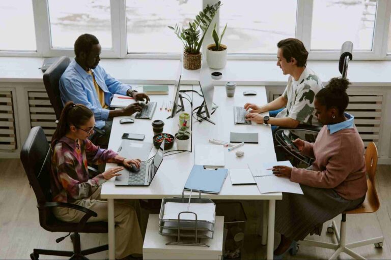 HR professional reviewing workforce information to understand what is employee turnover in business and support employee retention.